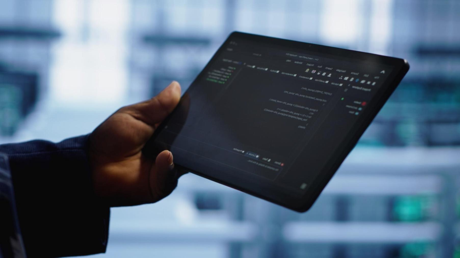 Remote learning setup with dual monitors displaying blockchain development tools and documentation